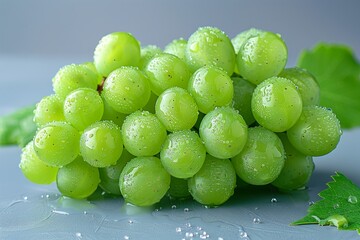 Fresh green grapes with water drops on white background.