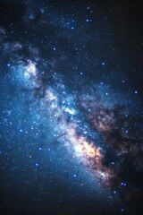 Obraz premium A dramatic close-up view of a galaxy's core, brilliantly lit and teeming with colors, showcasing the dynamic and energetic processes at the heart of a galaxy