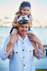 Sailor, portrait or child at sea with father or captain at ocean for service duty, reunion or love at harbour. Happy, shoulders and dad with girl for travel return or patriotic hero, family or navy