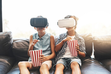 Siblings, popcorn and virtual reality headset in home of cyber experience, metaverse system or gaming connection. .Girl, boy and VR movie in living room for future, innovation and ui video technology