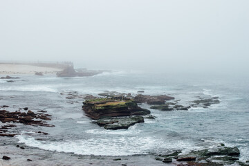 waves crashing on rocks