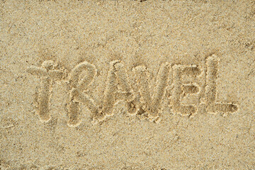 travel text on sand