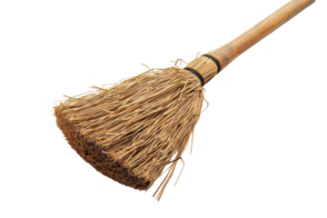 A broomstick with a straw handle and a straw head
