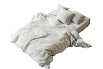 A white bed with a white comforter and pillows