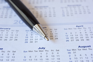 Close up luxury black pen on calender
