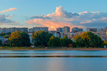 Obraz premium Eastern Europe past USSR city scape brutalism concrete buildings style panorama scenery view of living district and beach with river