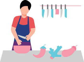 The boy is cutting vegetables.