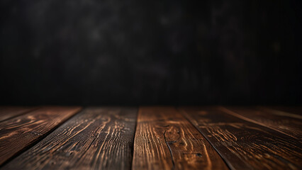 Empty dark wooden table top or surface on blurred black background. Banner with copy space. Template showcase scene for display, montage, advertising product.