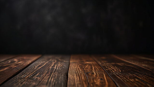 Empty dark wooden table top or surface on blurred black background. Banner with copy space. Template showcase scene for display, montage, advertising product.