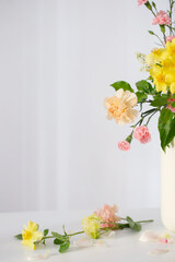 beautiful bouquet in white vase in sunlight