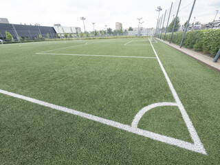 football field corner with artificial turf