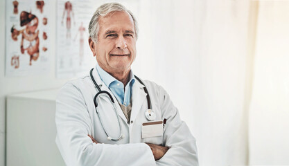 Doctor, portrait and mature man with arms crossed in hospital for healthcare, consult or...