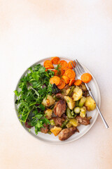 Stewed duck fillet with potatoes and asparagus and radishes, mixed salad of various greens, baked...