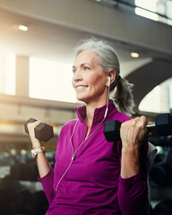 Fitness, weights and senior woman in gym for workout, training and cardio exercise with music....