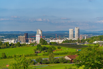 Skyline of Swiss City of Stettbach Dübendorf seen from Swiss City of Zürich on a sunny spring...