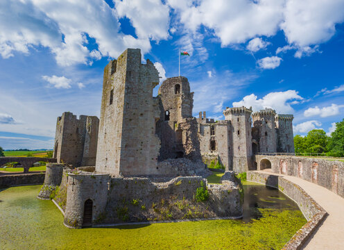 Ruined keep tower at a moat in Raglan Castle (Wales, United Kingdom)