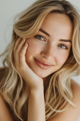 Naklejka premium Skincare, smile, and studio portrait of woman for beauty, aesthetics, cosmetics, spa, luxury, and self-love. Beauty model with skin care radiance, luster, and natural makeup.