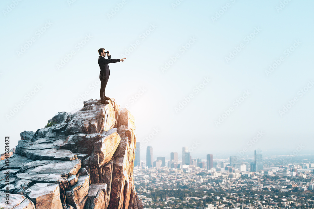Poster a businessman using a telescope atop a mountain, cityscape in the background, symbolizing vision. ge