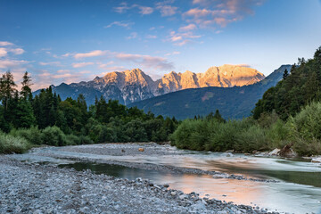 Stream of Taugl River during Sunrise with view of the Alps near Salzburg, Austria, Europe