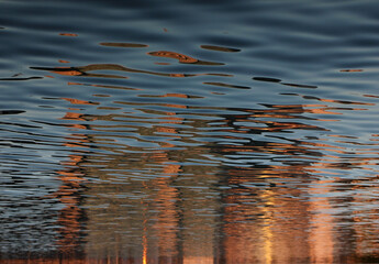 colored reflections on the surface of the lake	
