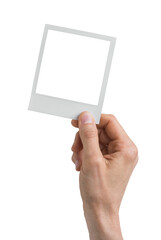 Vintage Polaroid mockup in hand - clipping path, Studio shot of instant photo frame isolated in...