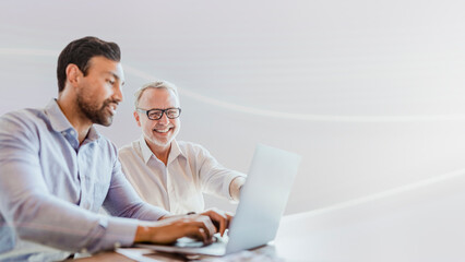 web developers working on a laptop