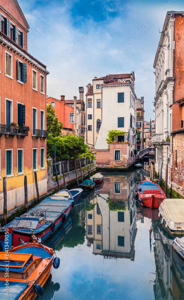 Wall mural Colorful spring view of Vennice with famous water canal and colorful houses. Splendid morning scene in Italy, Europe. Magnificent Mediterranean cityscape. Traveling concept background.