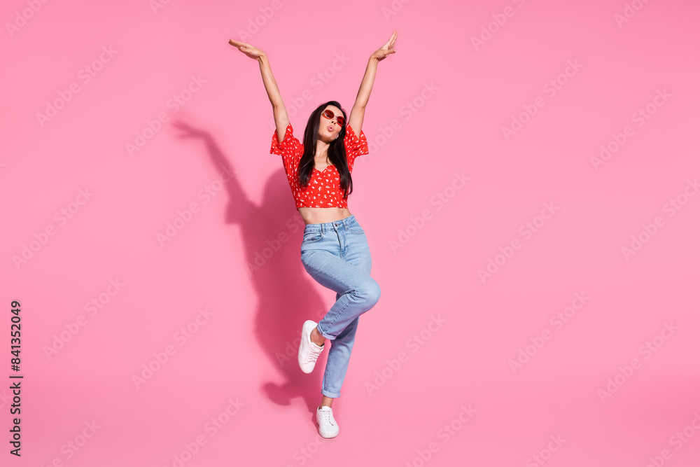 Poster Full size photo of pretty young woman raise hands dancing wear top isolated on pink color background