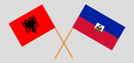 Crossed flags of Albania and Haiti. Official colors. Correct proportion