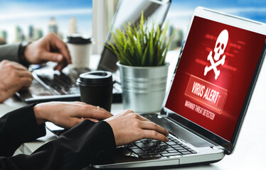 Virus warning alert on computer screen detected modish cyber threat , hacker, computer virus and...