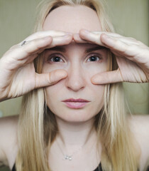 Examination of the fundus and dilated pupils, instillation of eye drops. The doctor performs...