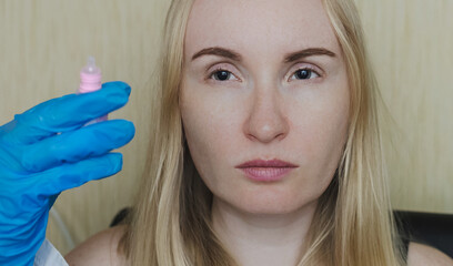 Examination of the fundus and dilated pupils, instillation of eye drops. The doctor performs...