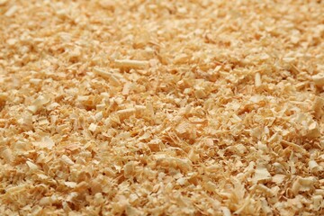Dry natural sawdust as background, closeup view