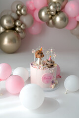 Happy birthday cake with balloons decorations