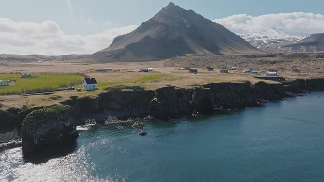 Aerial view of the cliffs between Arnarstapi and Hellnar in Snaefellsnes Snaefellsnes Regional Park in Iceland. Impressive summer view at sunny day of Iceland. Wonderful nature of Iceland.