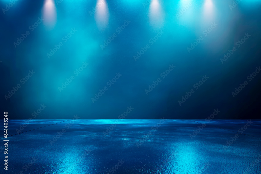 Poster an empty stage with blue lighting and a reflective floor, set against a dark backdrop, conveying a m