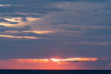 Black storm clouds over the dark sea.