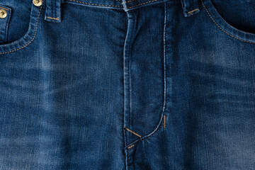 Blue jeans denim texture as a background. Top view.