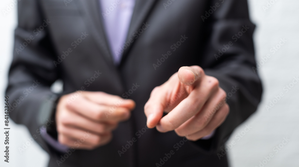 Poster businessman touching an imaginary screen with clipping path isolated on white background
