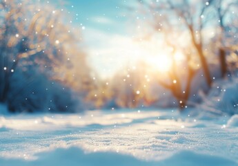A beautiful defocused blurred background image of forest, snowdrifts, and light snowfall in pinkish light on a sunset day in winter.