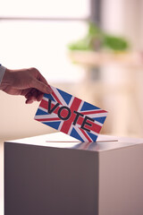 Hand Casting Vote With Union Jack Flag