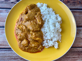 home cooked Thai satay peanut curry with chicken and jasmine rice 