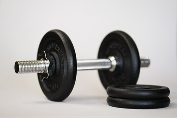 Naklejka premium Dumbbells for sports are on a white background