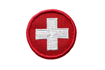 Obraz premium Swiss flag patch isolated on transparent background. Red circle badge with white cross symbol for national identity and travel. Embroidered design.