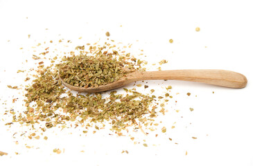 Oregano on wooden spoon and scattered isolated on white background. Oregano is a common garnish for pizzas, sauces, vegetable and meat dishes. Has a strong fragrance.