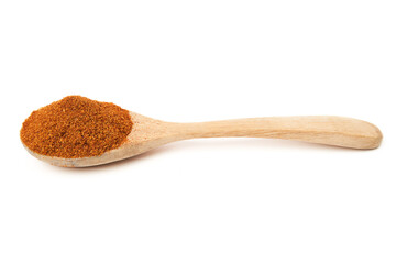 Wooden spoon of Paprika powder isolated on white background. Sweet Red Chili Powder. Paprika Powder for Garnish, Season, make spice rubs or marinades.