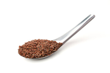 Brown flax seeds on spoon isolated on white background. Brown Flax Seed  is rich in nutrients such as dietary fiber and essential fatty acids that are beneficial to the body.