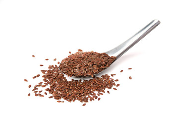Brown flax seeds on spoon and scattered isolated on white background. Brown Flax Seed is rich in nutrients such as dietary fiber and essential fatty acids that are beneficial to the body.