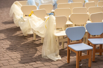 empty chairs for a children's concert