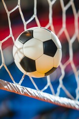 Naklejka premium Dynamic handball goal moment ball hits net in celebratory freeze, evoking summer olympic excitement